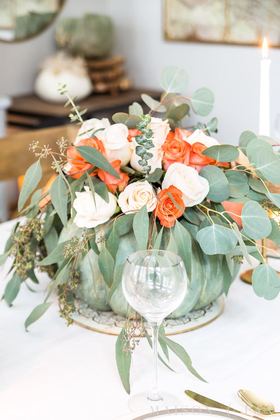 green pumpkin with roses and eucalyptus
