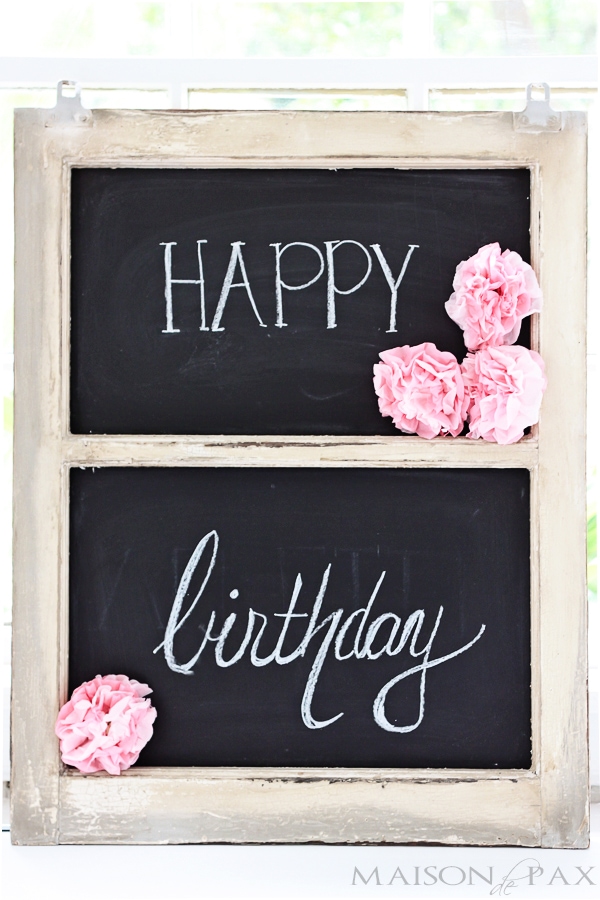 simple decorations for a first birthday party with a chalkboard frame- Maison de Pax