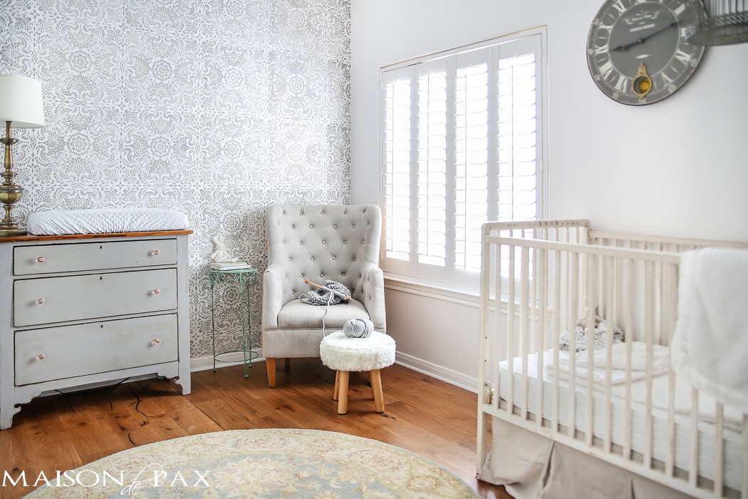 I just love this room! Gray and White Girl's Nursery: patterned stencil accent wall and soft gray and white textures create a beautiful, serene space for a little girl | aiweb9ygdry.cmersite.com