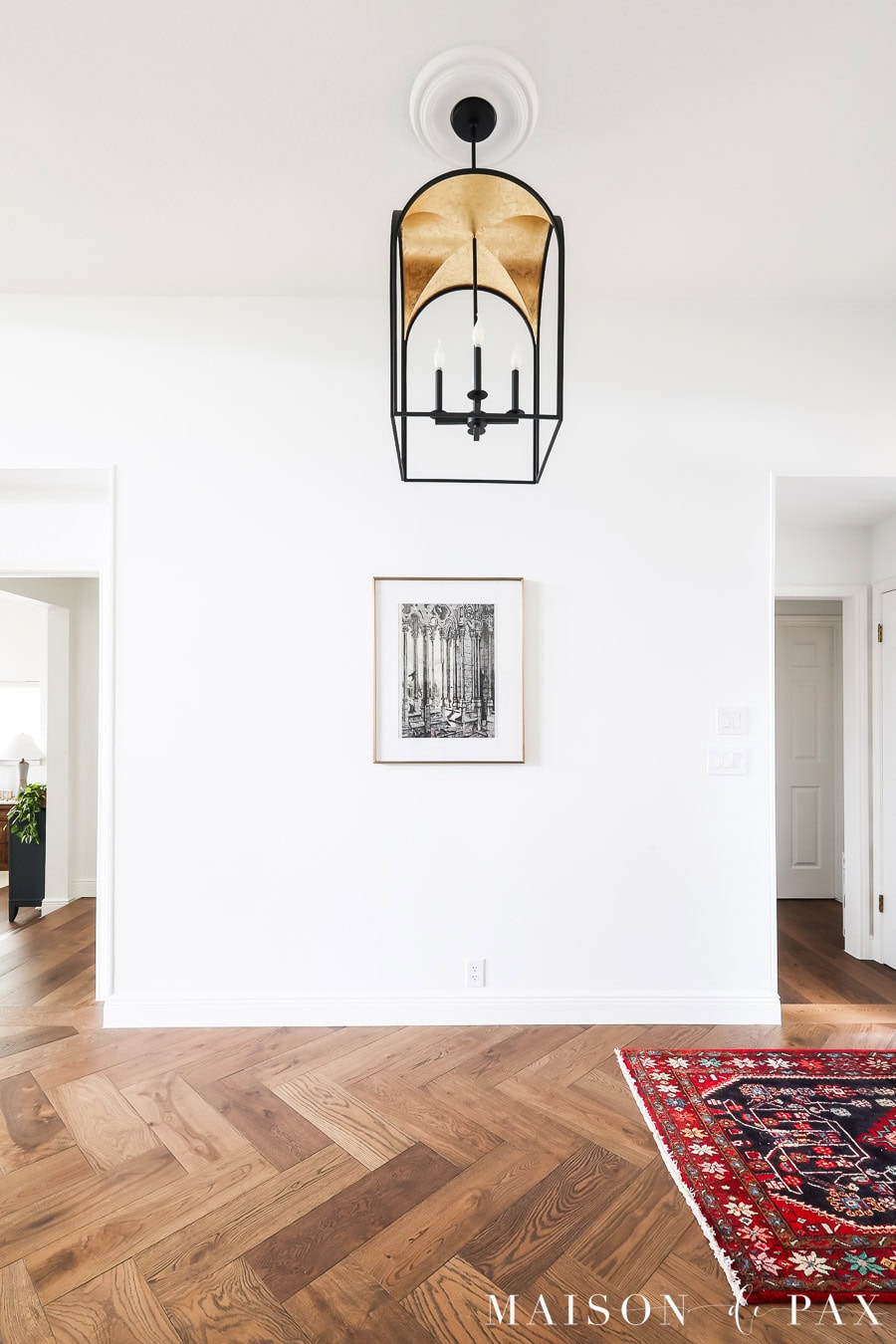 white walls, brown herringbone white oak floors