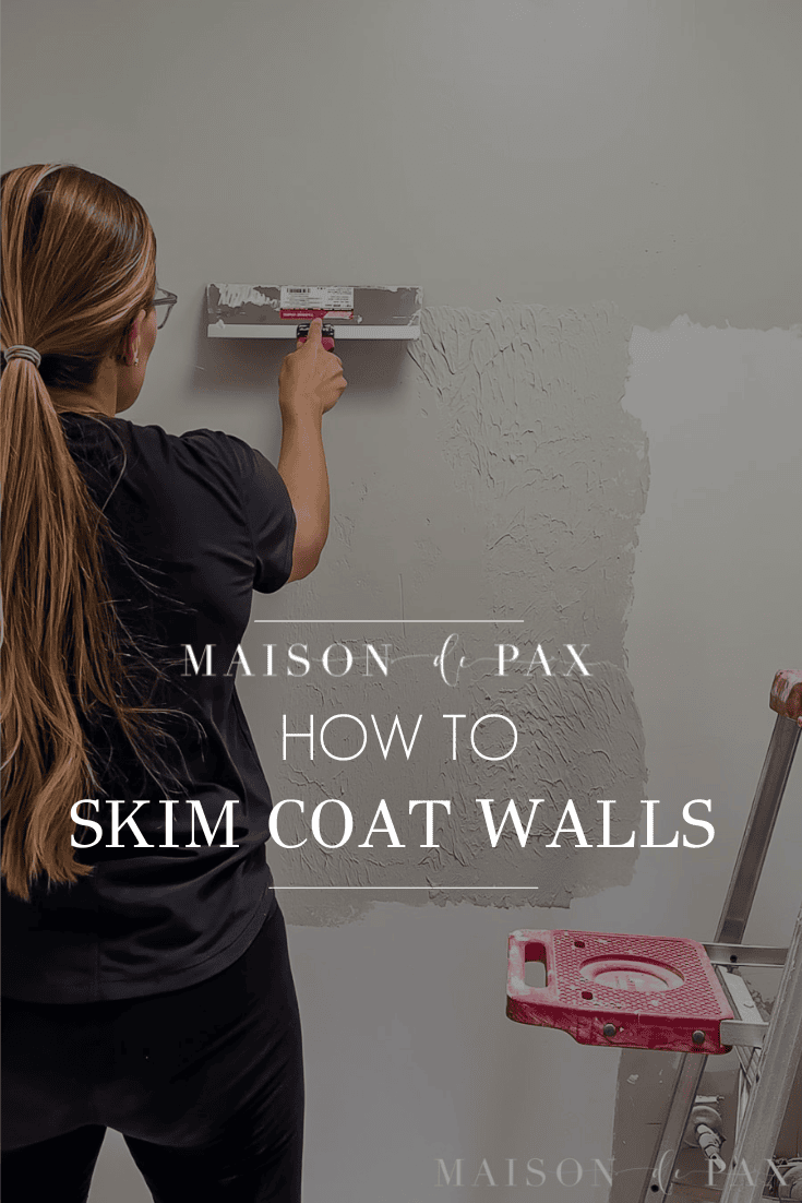 woman using drywall knife - how to skim coat walls