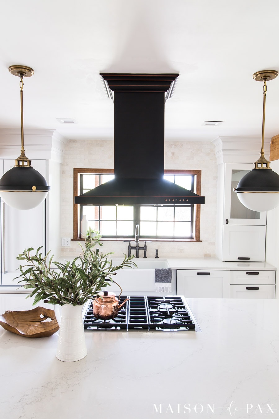 black island range hood over industrial range | Maison de Pax