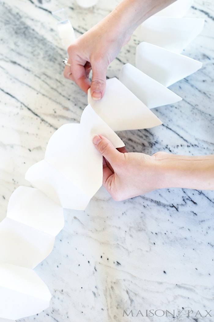 tape sections together to make a longer paper heart chain- Maison de Pax