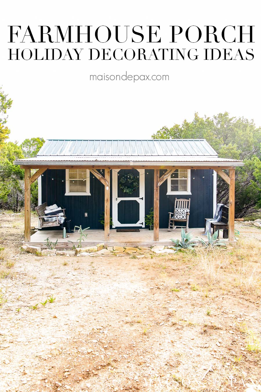 black and white tiny house out in the country with a charming porch