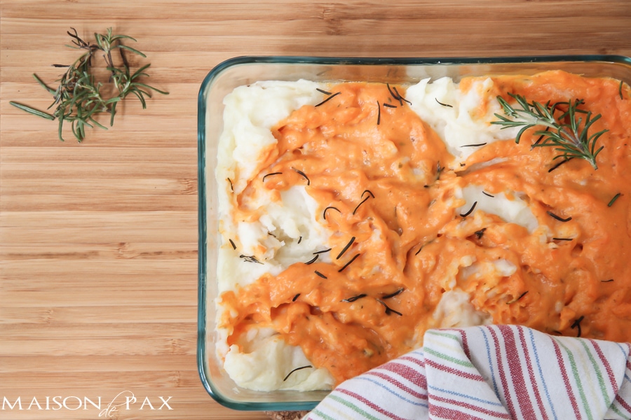 Deliciously seasoned sweet and golden potatoes. Swirled. Baked. You'll never make two separate dishes again! via aiweb9ygdry.cmersite.com #recipe #mashed #potatoes #sweet #thanksgiving #fall