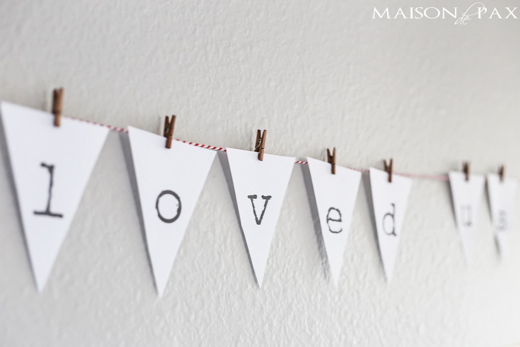 "he first loved us" adorable printable bunting on red and white baker's twine - Maison de Pax