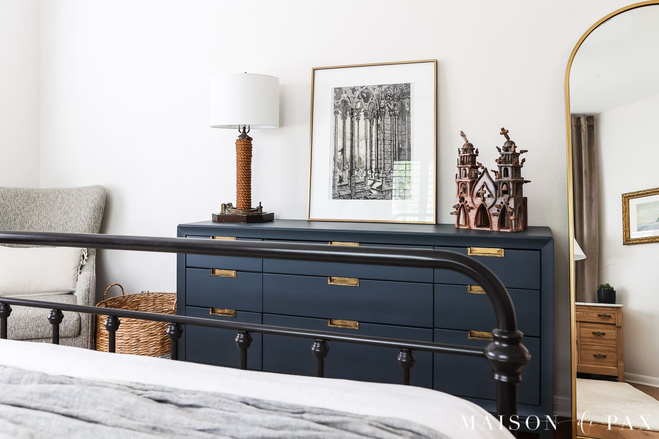 iron bed with painted dresser