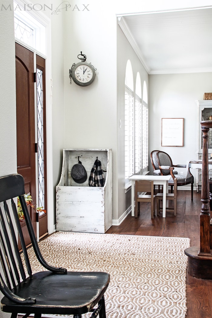 gorgeous, functional entryway with an antique wood firebox used as a mini mudroom... get the plans to build this diy planked "antique" firewood box here! | aiweb9ygdry.cmersite.com