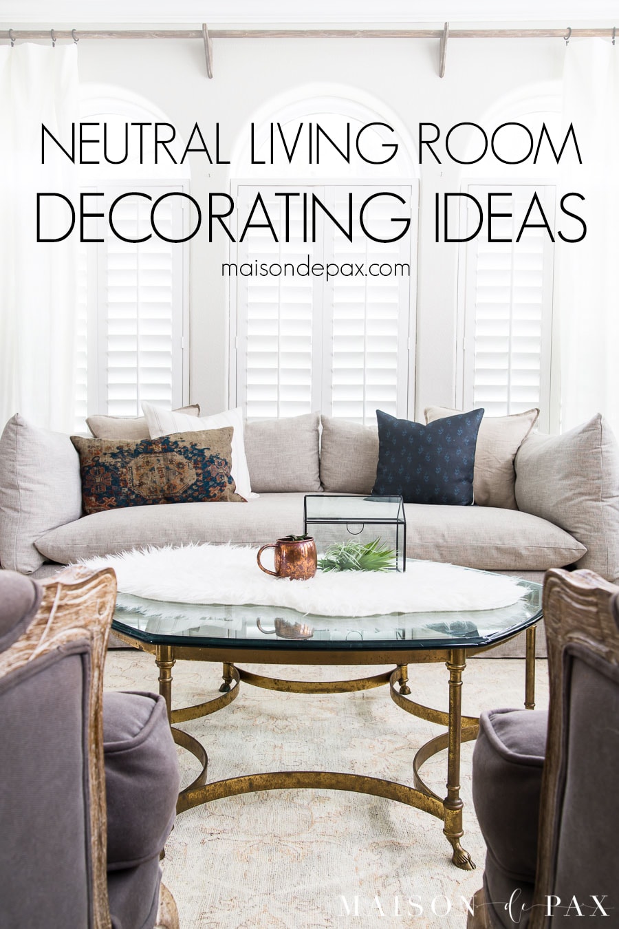brass coffee table, linen sofa, wood and fabric armchairs, neutral area rug | maison de pax