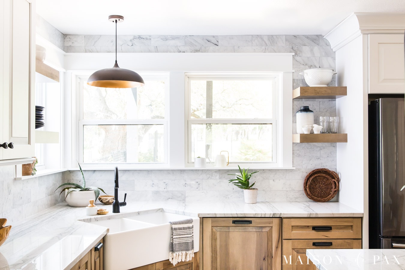 corner farmhouse sink with windows above | Maison de Pax