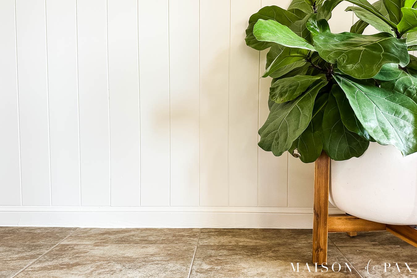 nickel gap paneling installed without removing baseboard