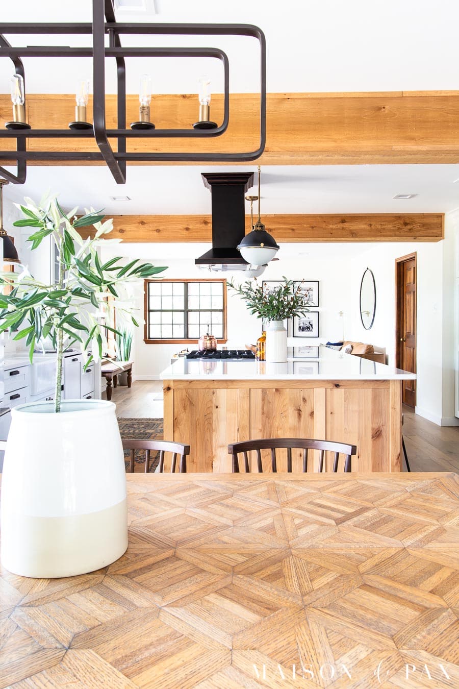 olive tree in crock on dining table | Maison de Pax