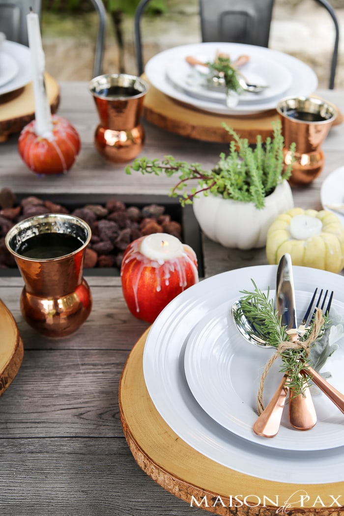 Looking for creative, easy fall decor? Learn how to make adorable mini pumpkin, gourd, and apple candles with step by step instructions and a video tutorial!