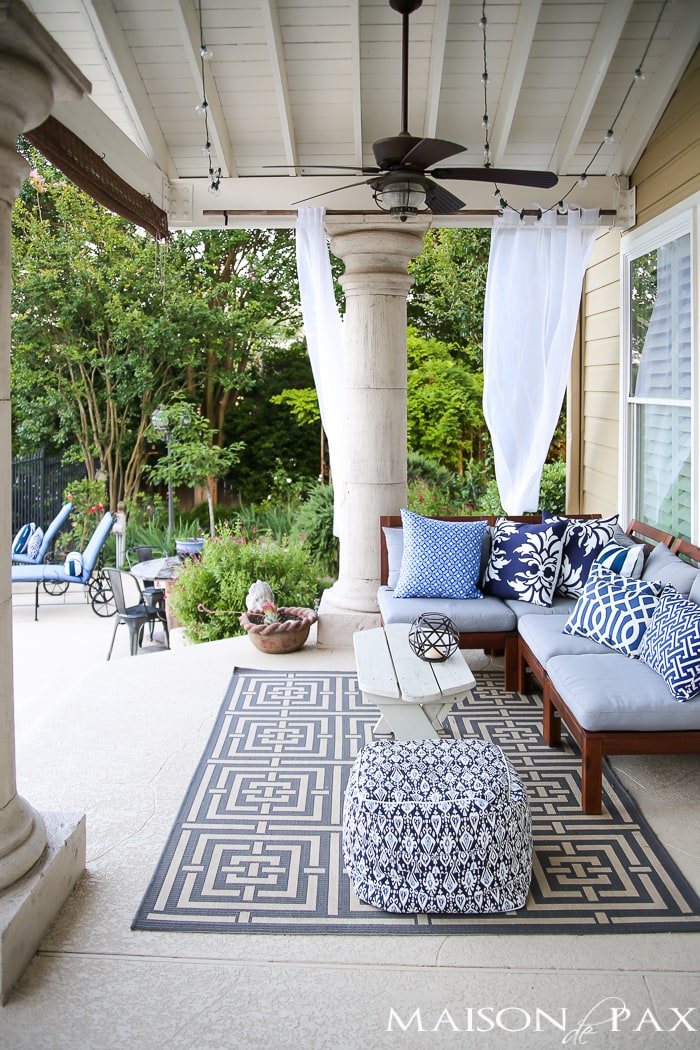 Outdoor Decorating Tips: Ikea sectional is an affordable base to a gorgeous, layered patio