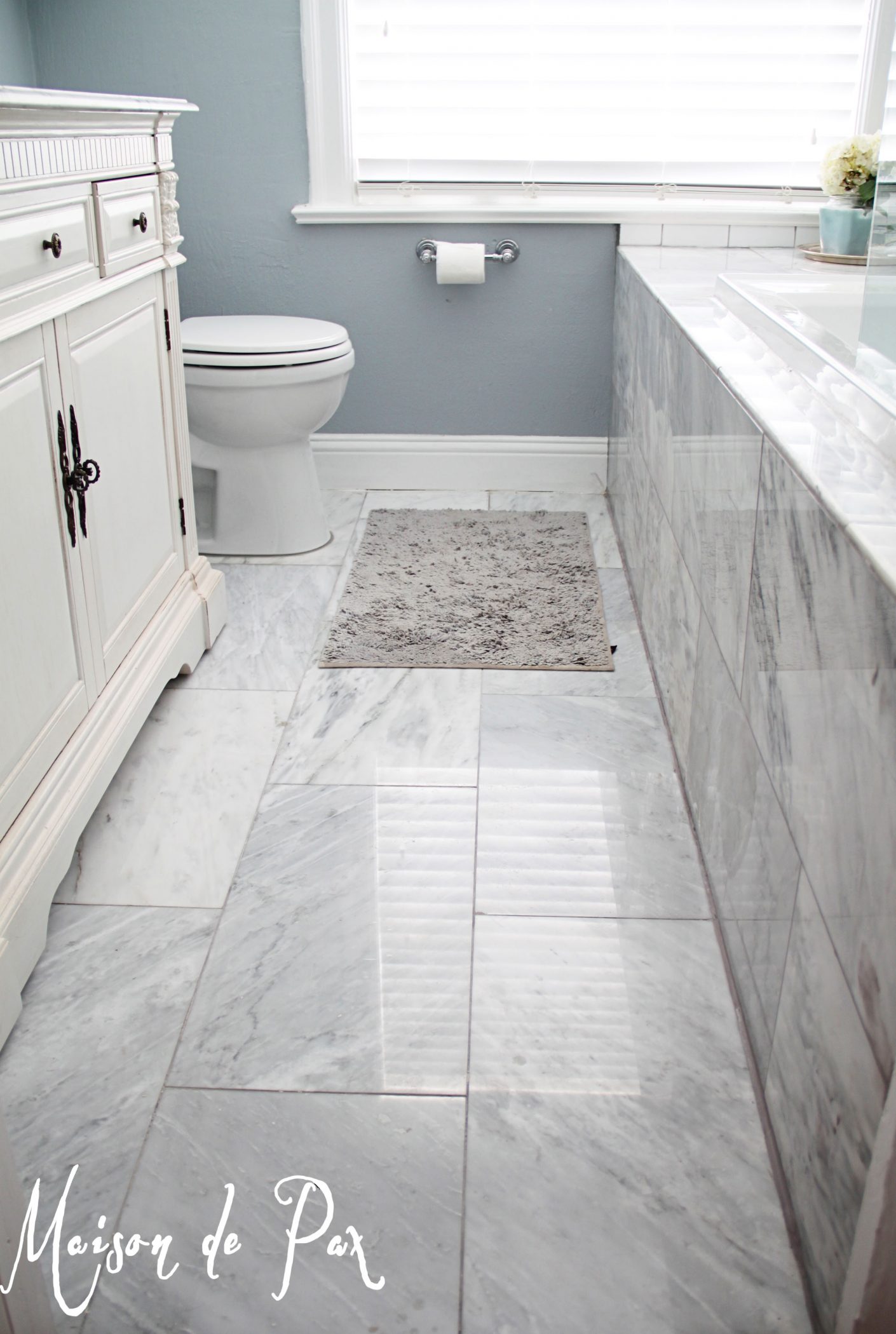 A classic, chic design for a fairly small bath.