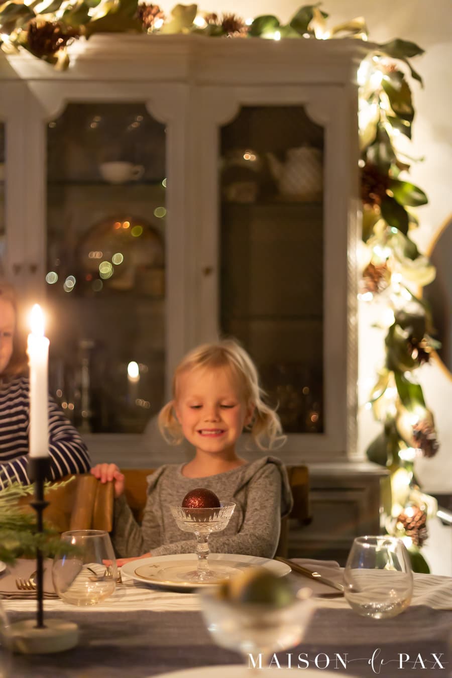 little girl enjoying the magic of Christmas