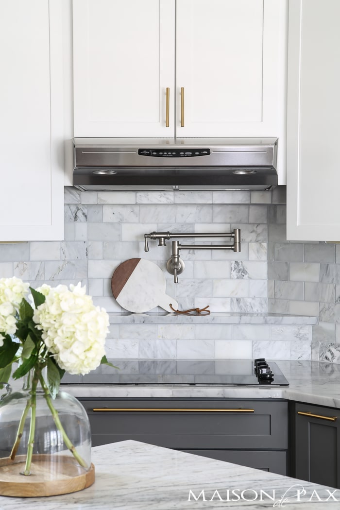 Two-toned gray and white cabinet with marble subway tile- Maison de Pax