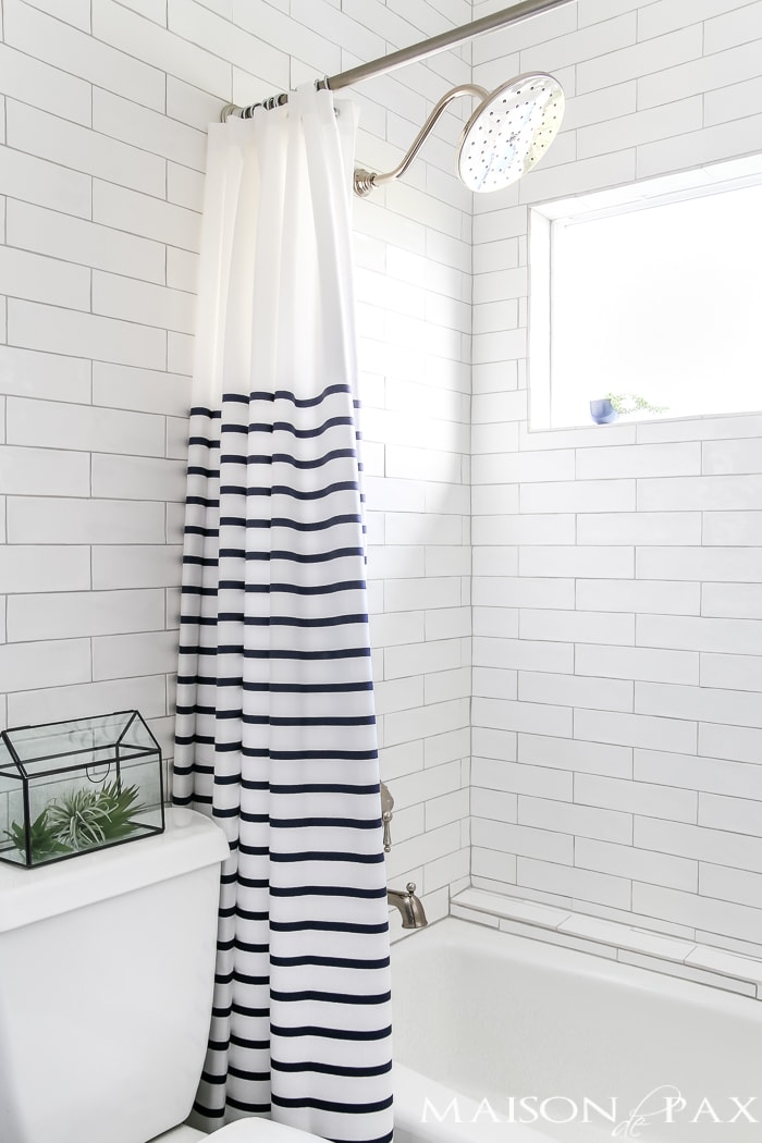 Navy and white bathroom with brass and wood accents: gorgeous rain head shower set!- Maison de Pax