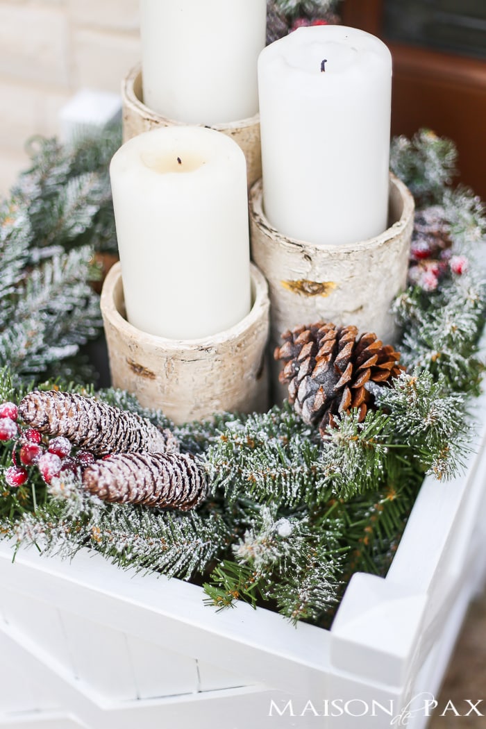 Greenery and Red Holiday Front Porch: What a beautiful, classic look! Get Christmas front porch decorating ideas here!