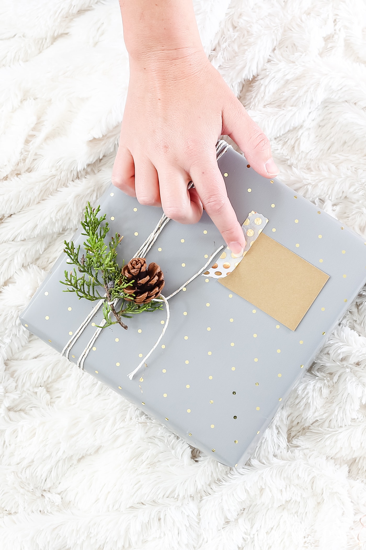easy gift wrapping ideas: secure gift tags with a quick strip of washi tape #christmaspresents #giftwrap