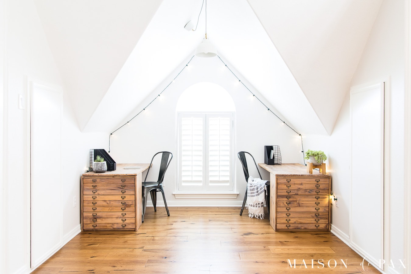 white room with wide plank rustic engineered oak flooring | Maison de Pax