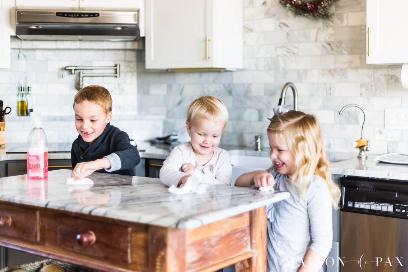 kids cleaning kitchen island | Maison de Pax