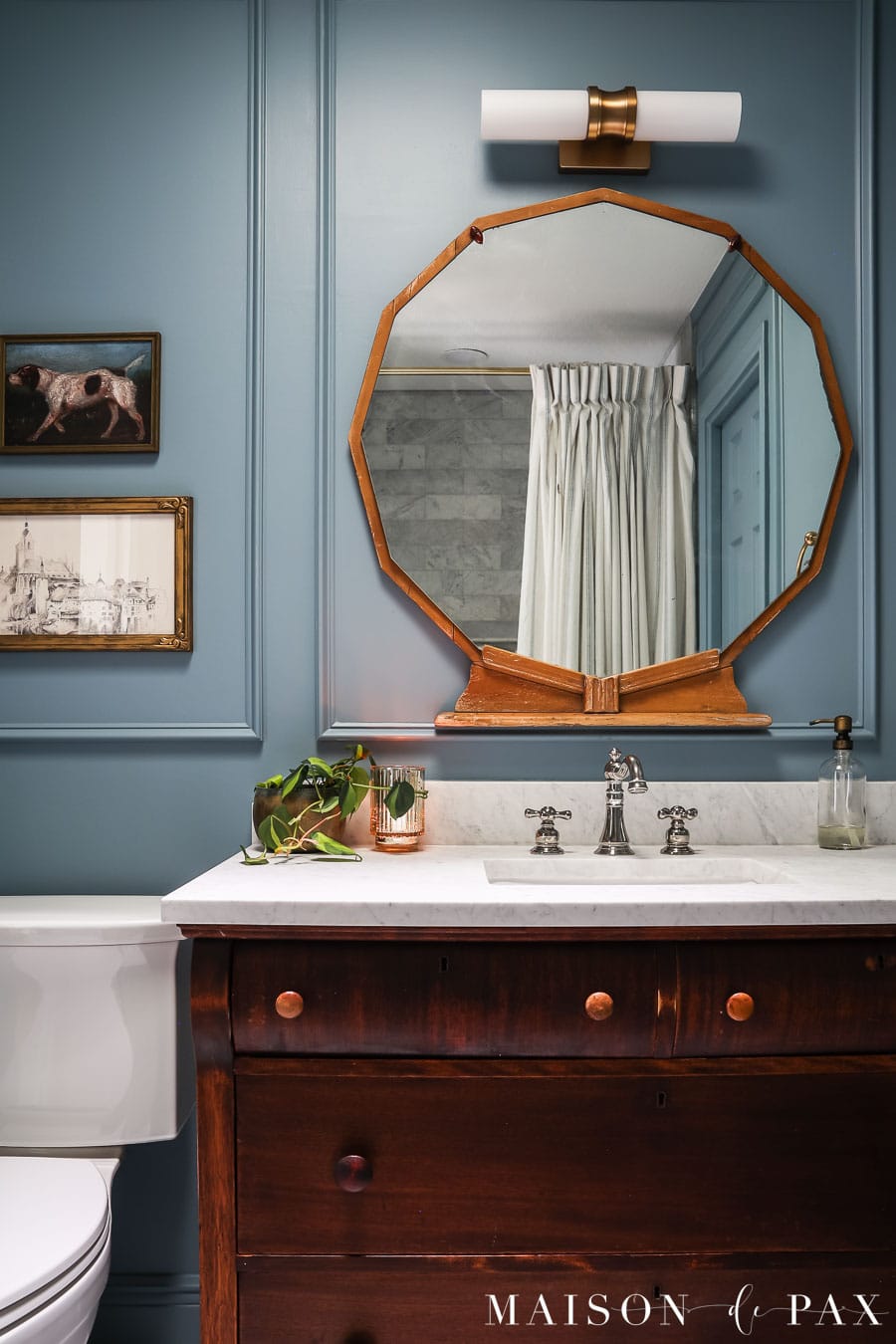 dark wood vanity with carrara marble top
