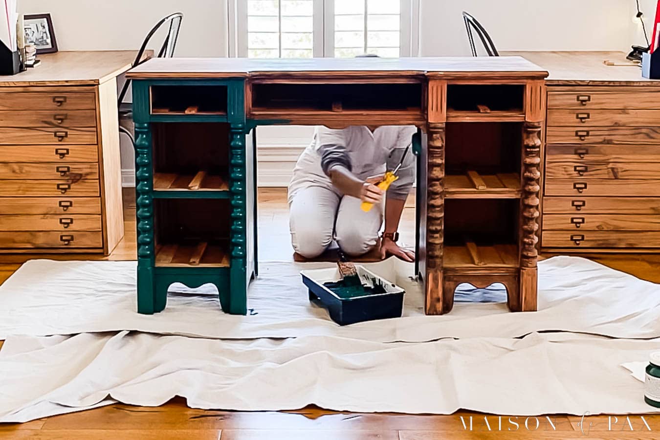painting wood desk using foam roller and brush