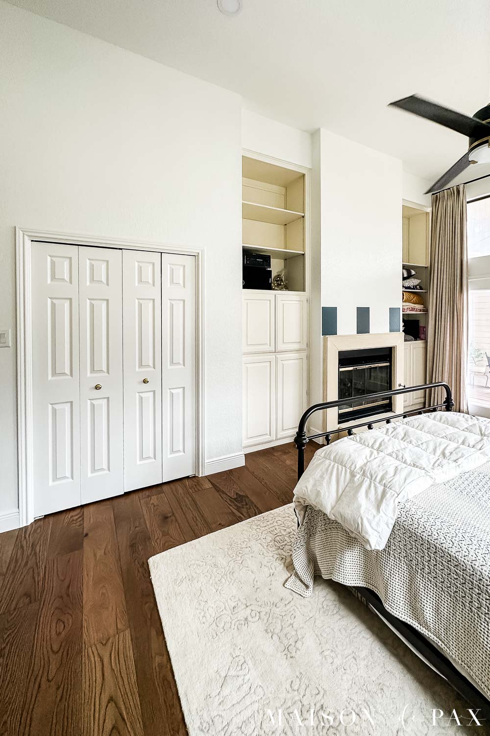 bedroom with fireplace before renovation
