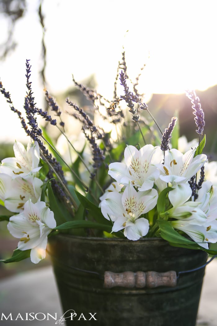 lavender and alstroemeria in a rustic bucket - such a simple and elegant centerpiece | aiweb9ygdry.cmersite.com