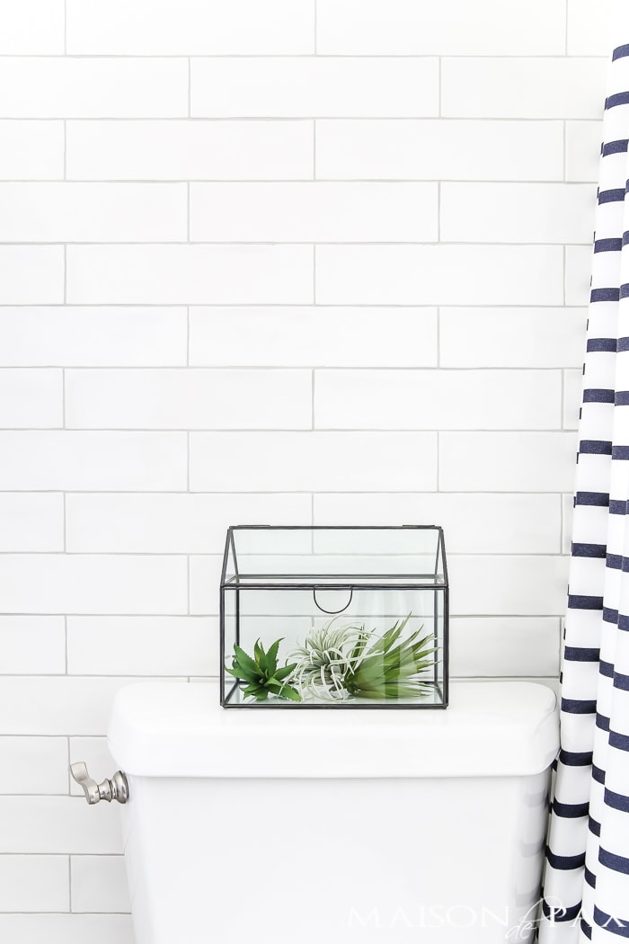 Navy and white bathroom with brass and wood accents- Maison de Pax