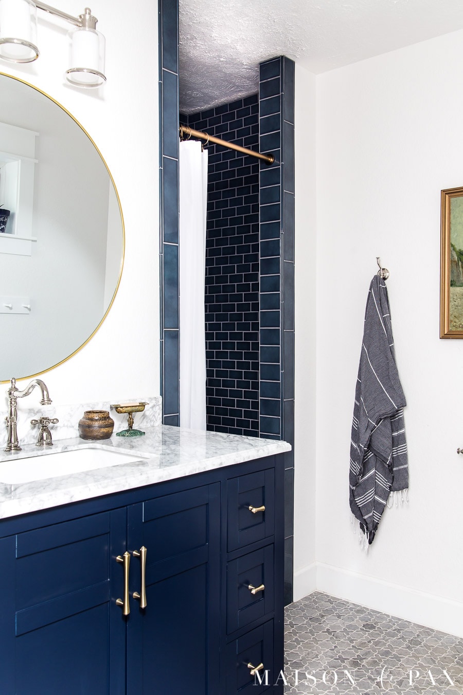 blue brick pattern shower tile in guest bathroom