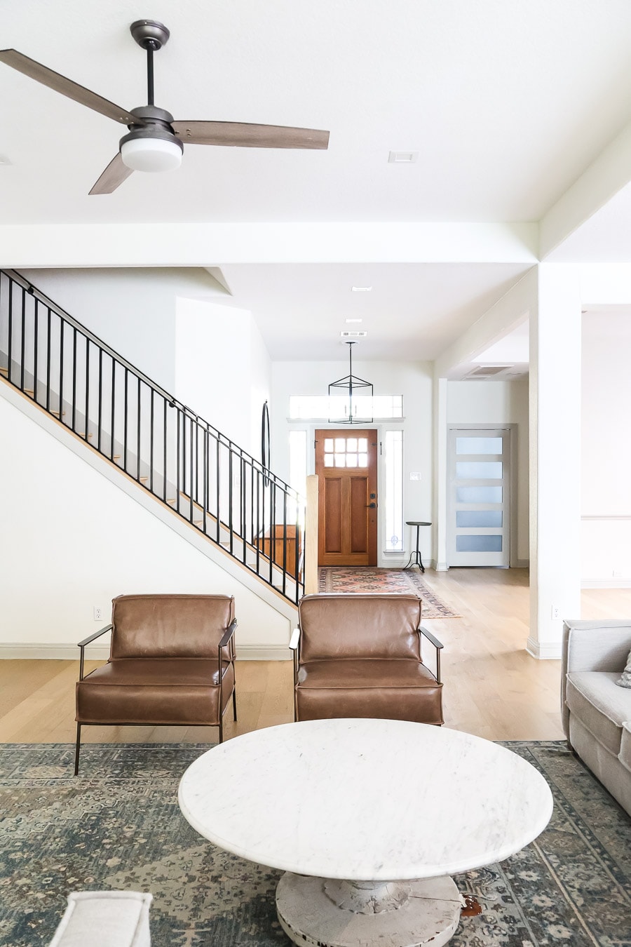 SW Alabaster walls with light wood floors and repose gray trim