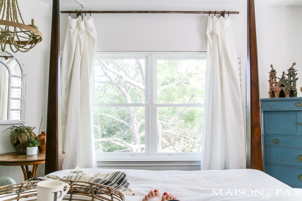 Relaxed, natural, neutral master bedroom with lots of white and touches of boho texture... the perfect retreat!