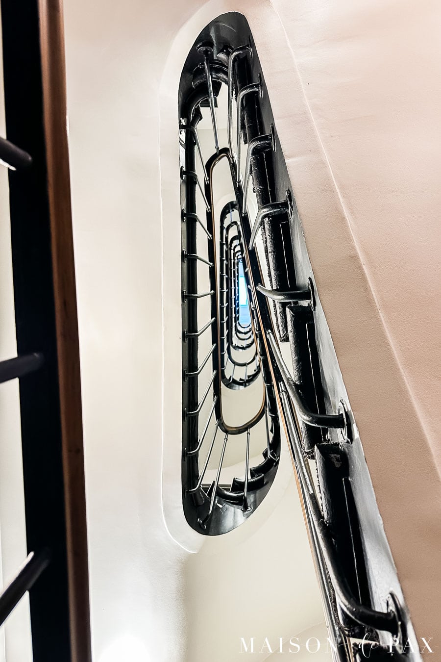 curved wood and plaster staircase