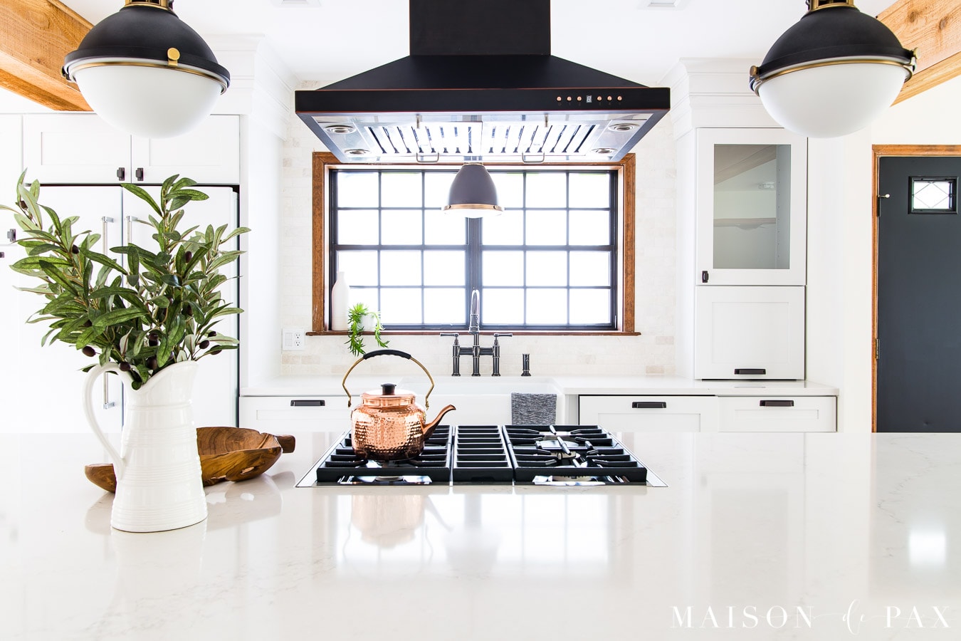 white marble-look quartz countertops on large kitchen island | Maison de Pax