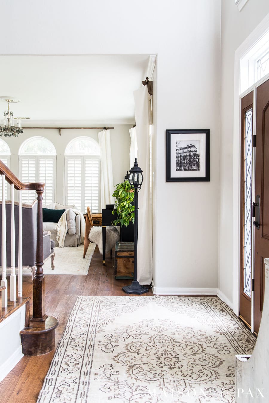 neutral entryway with vintage turkish rug | Maison de Pax