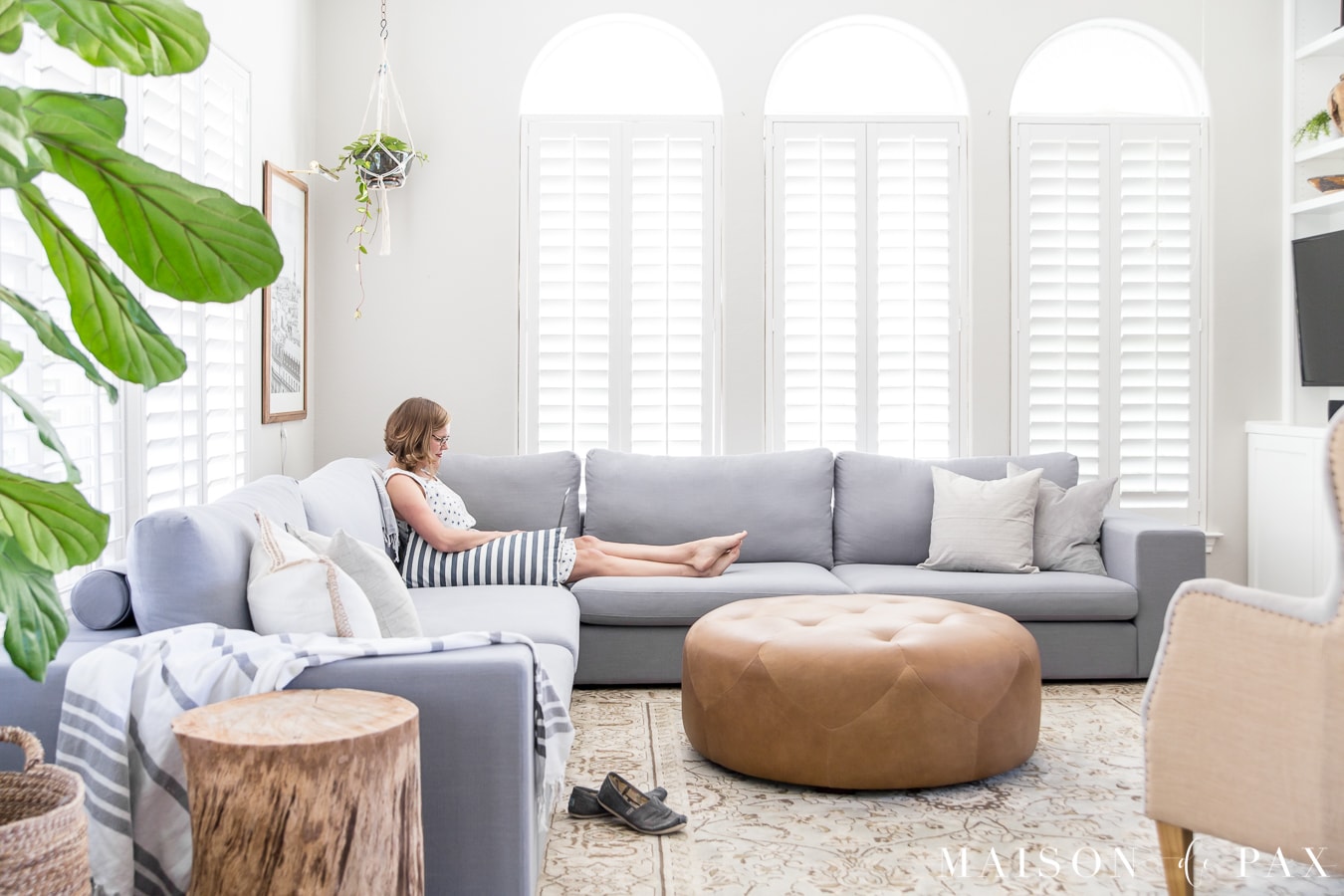 Bright living room design with sectional- Maison de Pax