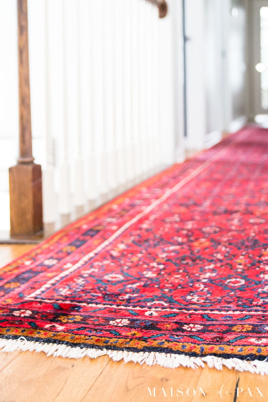 red, blue, and orange vintage Persian rug runner