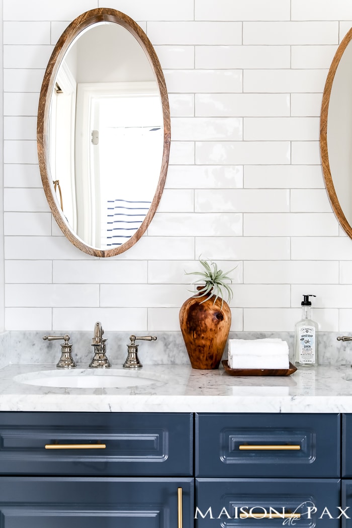 sophisticated jack and jill bathroom with floor to ceiling tile- Maison de Pax