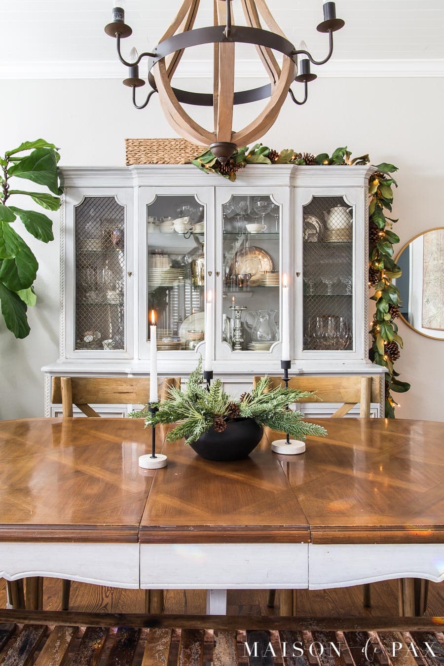 black bowl with greenery dining room holiday decor