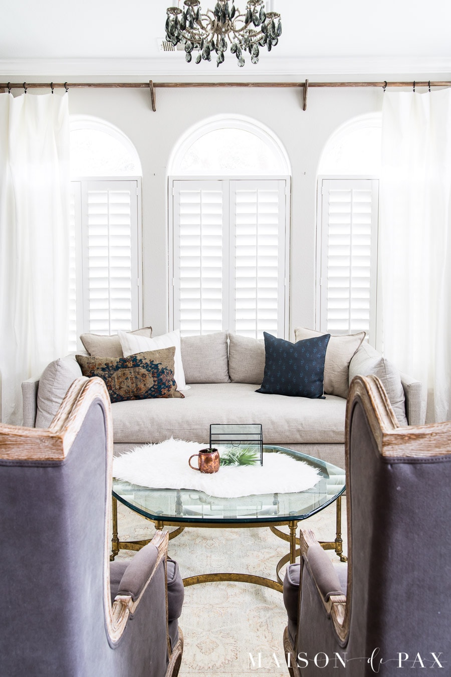 SW Agreeable Gray walls with slipcovered sofa and gray armchairs | Maison de Pax