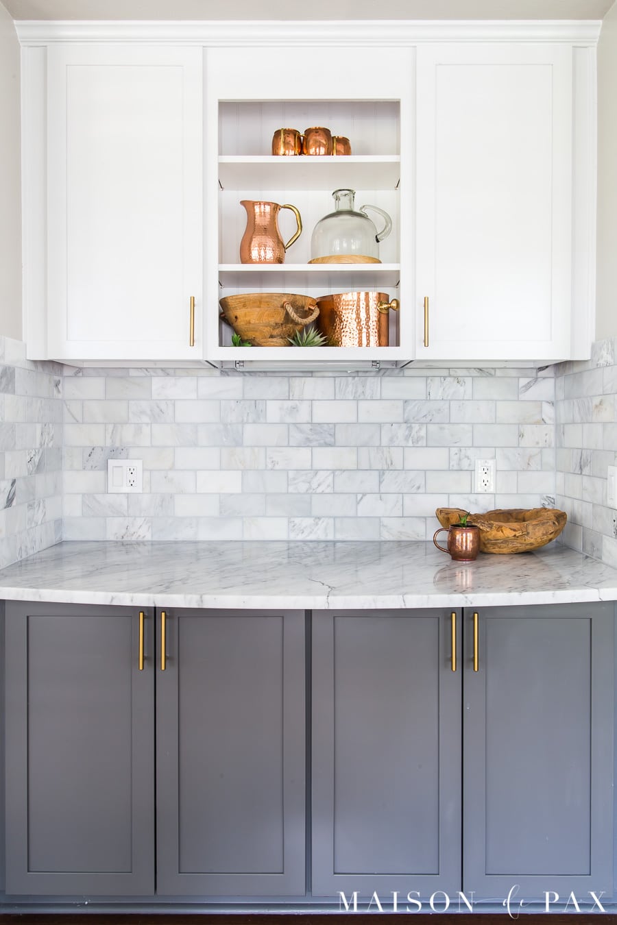 kitchen with gray lower cabinets and white upper cabinetes