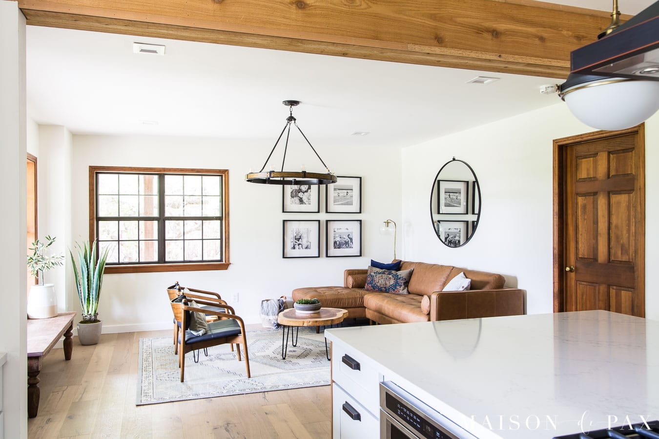 giant kitchen island open to living room | Maison de Pax