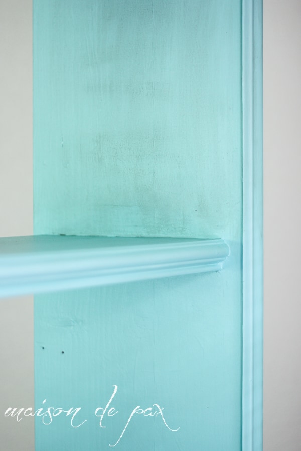 Fabulous "vintage aqua" bookcase makeover for adorable and functional playroom storage at aiweb9ygdry.cmersite.com #makeover #furniture #paint #diy #tutorial #chalkpaint