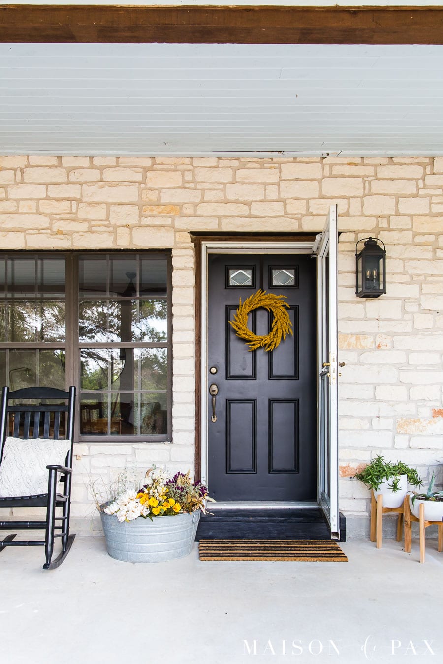 modern farmhouse front porch with fall decorations | Maison de Pax