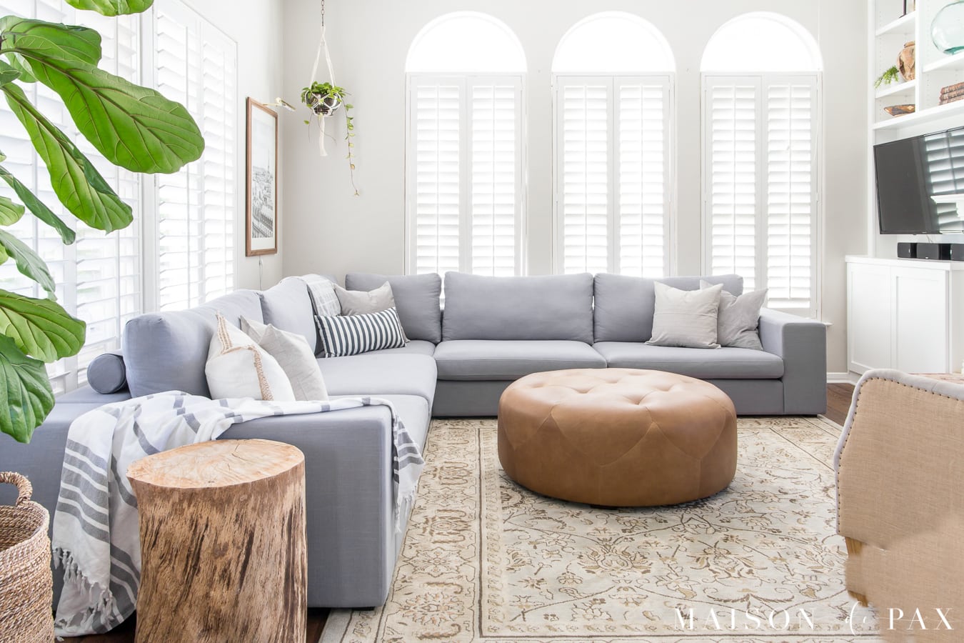 Bright living room design with sectional- Maison de Pax