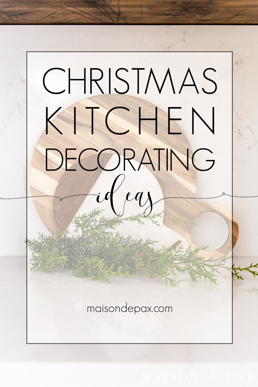 cutting boards with fresh holiday greenery | Maison de Pax