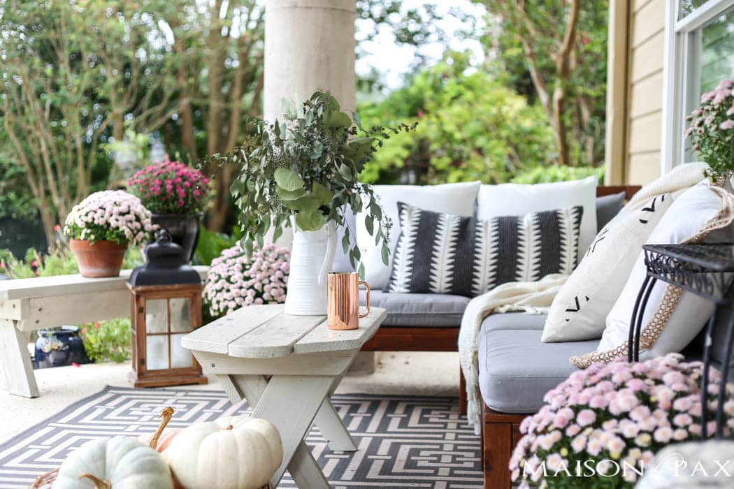 pale pink mums and eucalyptus make a soft, elegant fall porch- Maison de Pax