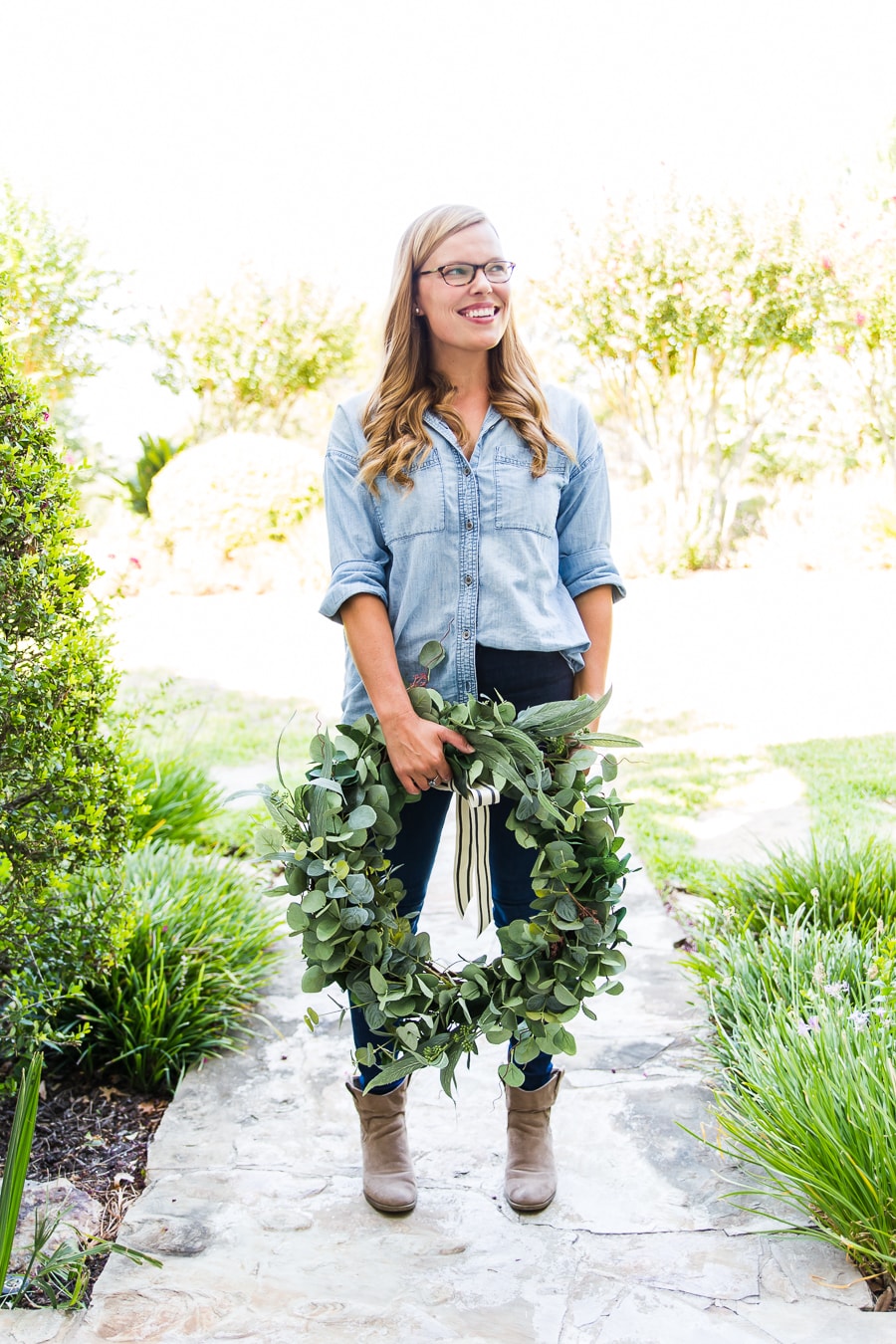 woman holding large mixed eucalyptus wreath | Maison de Pax